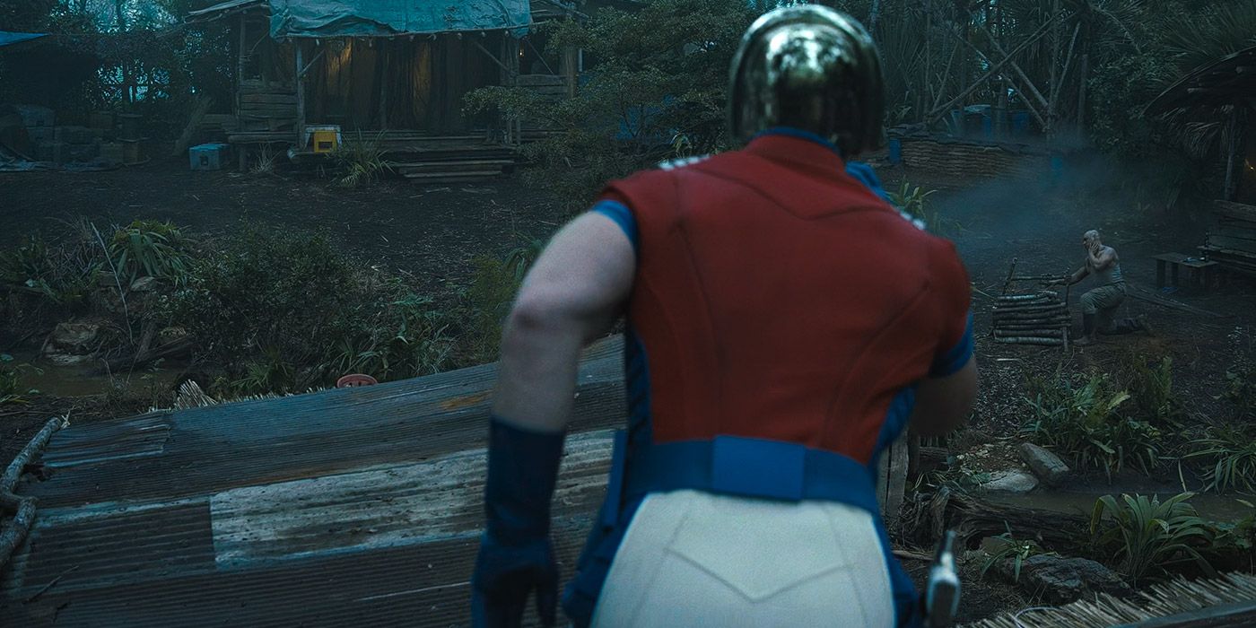 Peacemaker uses a blow dart to kill a soldier in The Suicide Squad