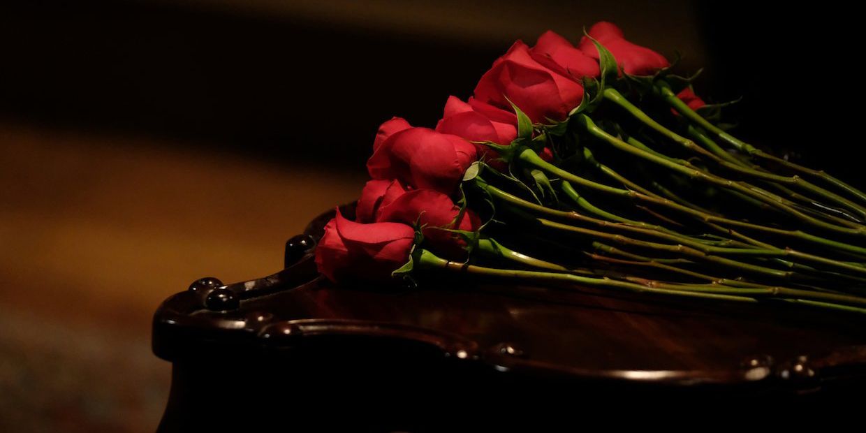 A bunch of roses lay on a table in The Bachelor.