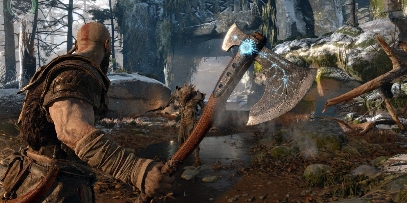 Kratos holding the Leviathan Axe as a Draugr charges towards him in God of War.