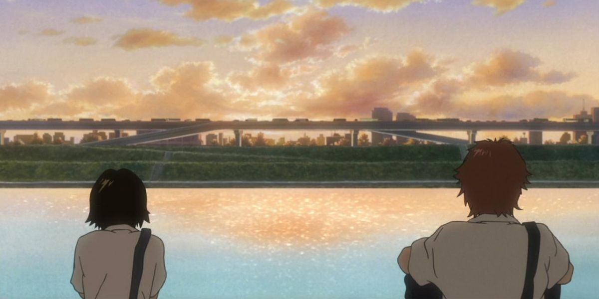 Makoto and her love interest watch the sunset in The Girl Who Leapt Through Time.