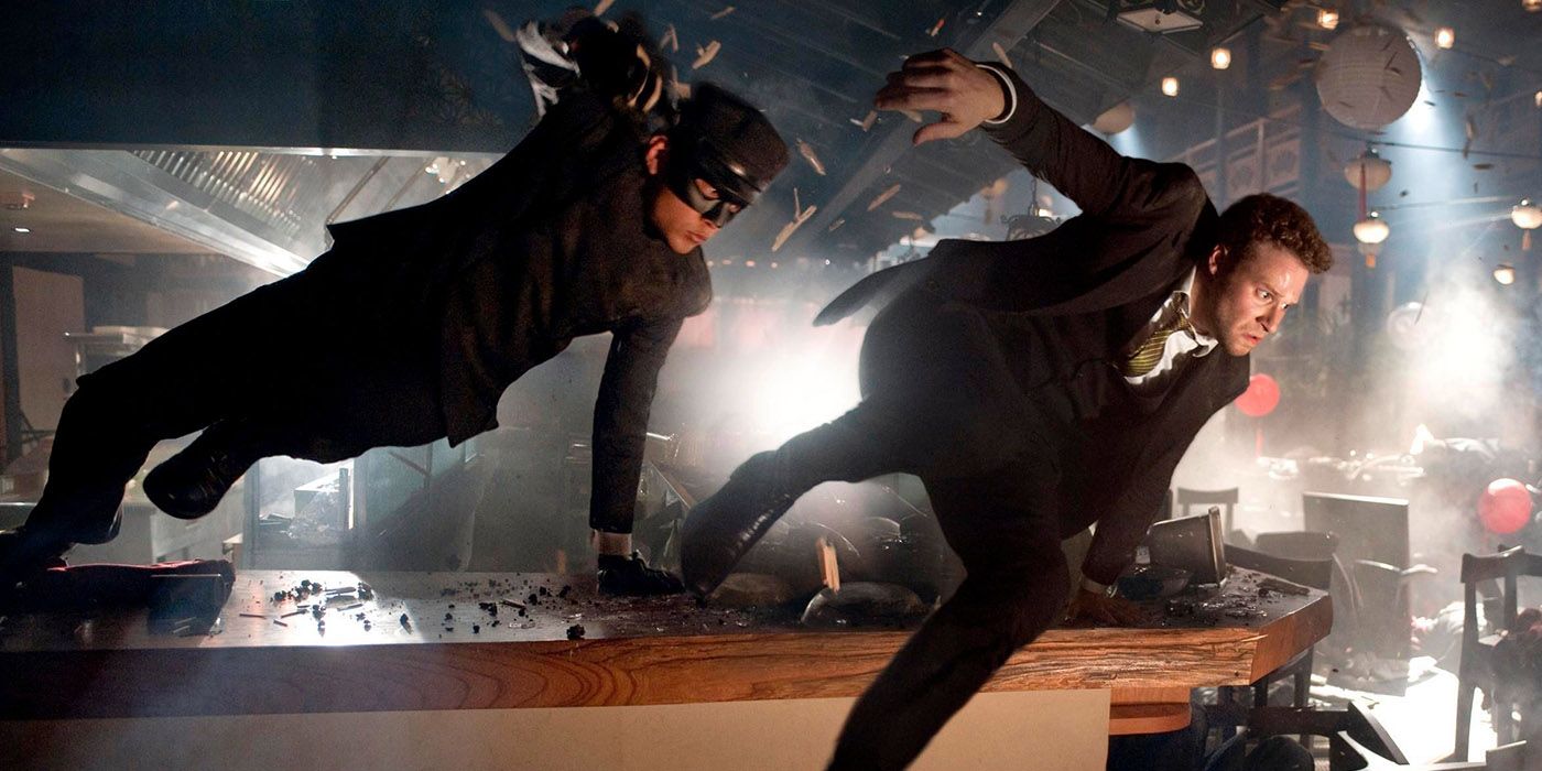 Britt and Kato leap over a bar in The Green Hornet