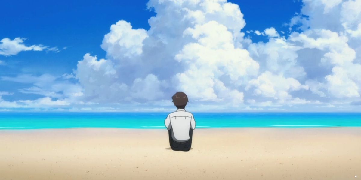 Shinji stares into the water, but the beach isn't the one that normally appears in Evangelion.