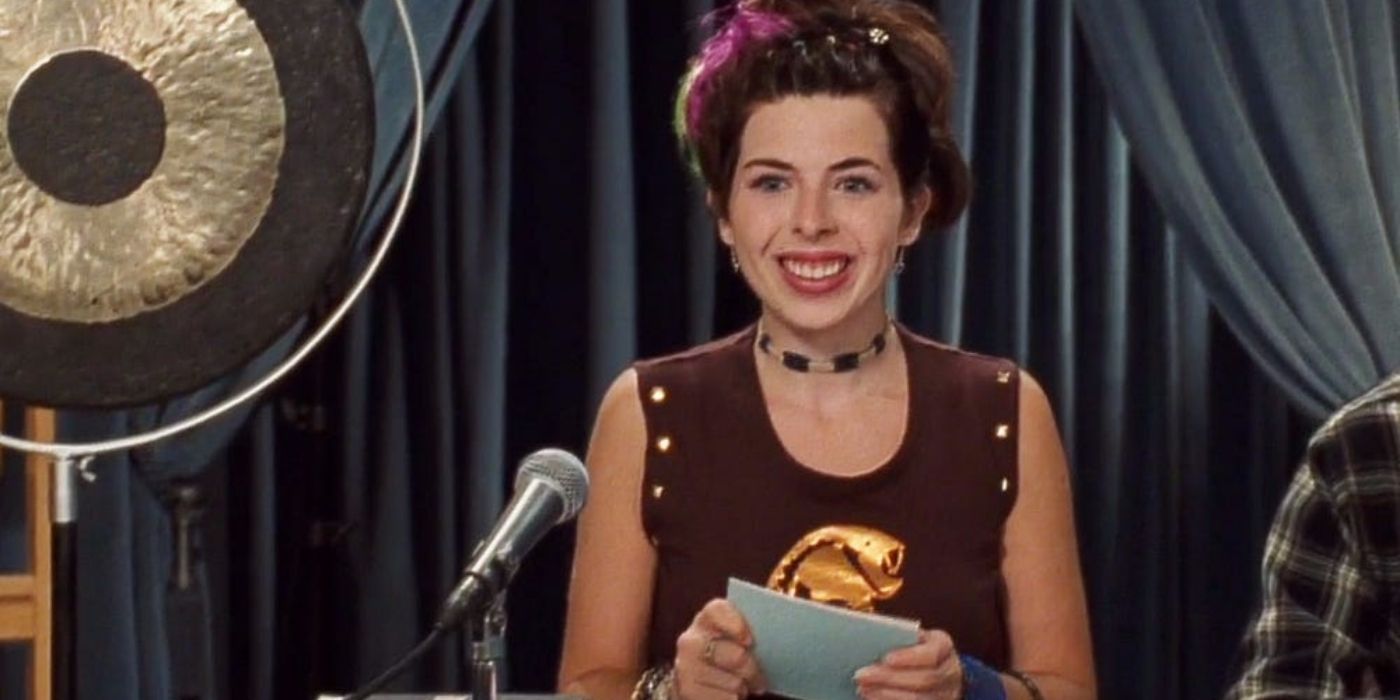 Lilly smiling during her radio show in The Princess Diaries