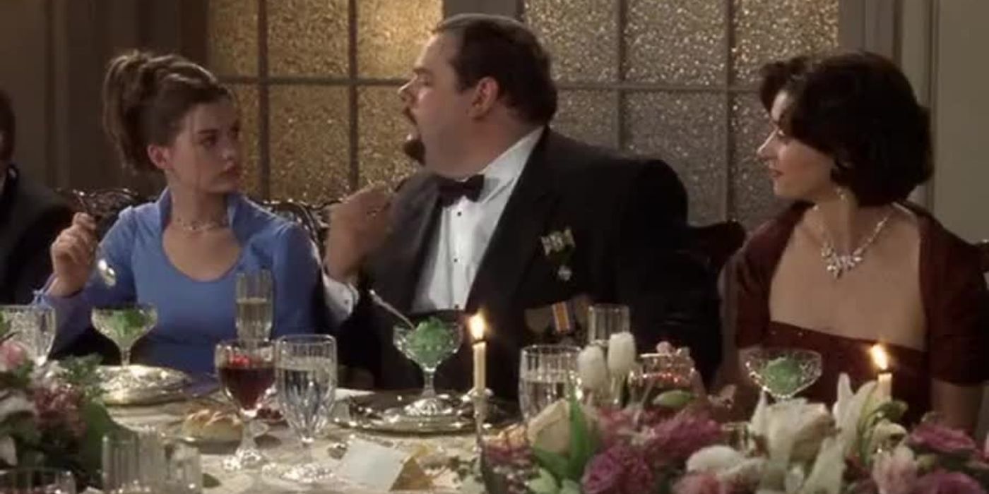 Prime Minister and Mrs. Motaz talking to Mia at the dinner table in The Princess Diaries
