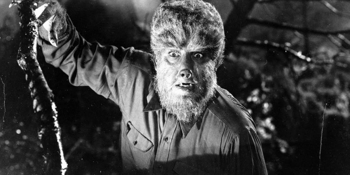 The Wolf Man raising ar arm menacingly in 1941's The Wolf Man
