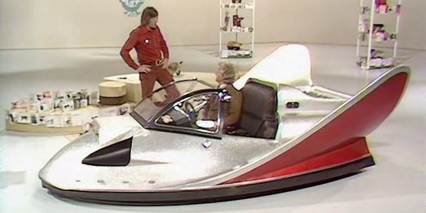 Jon Pertwee sits inside the Whomobile on the set of Blue Peter.