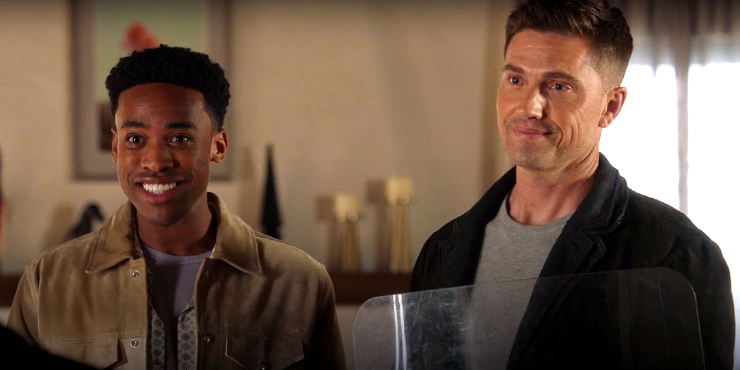 Tim (Eric Winter) and Jackson (Titus Makin Jr.) talking to Angela in The Rookie.