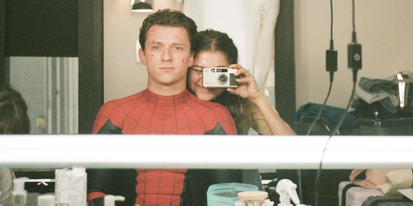 Tom Holland and Zendaya in a dressing room taking a photo