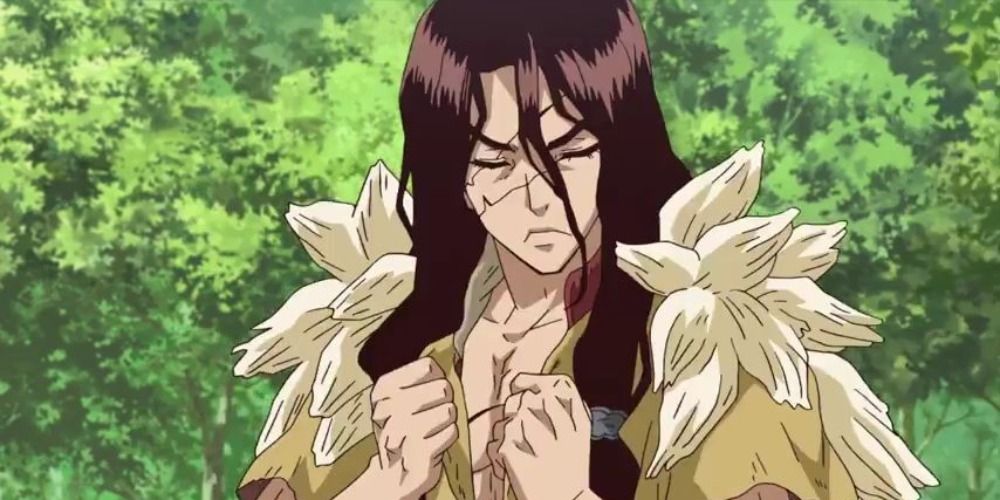Tsukasa from Dr Stone putting on a fur coat