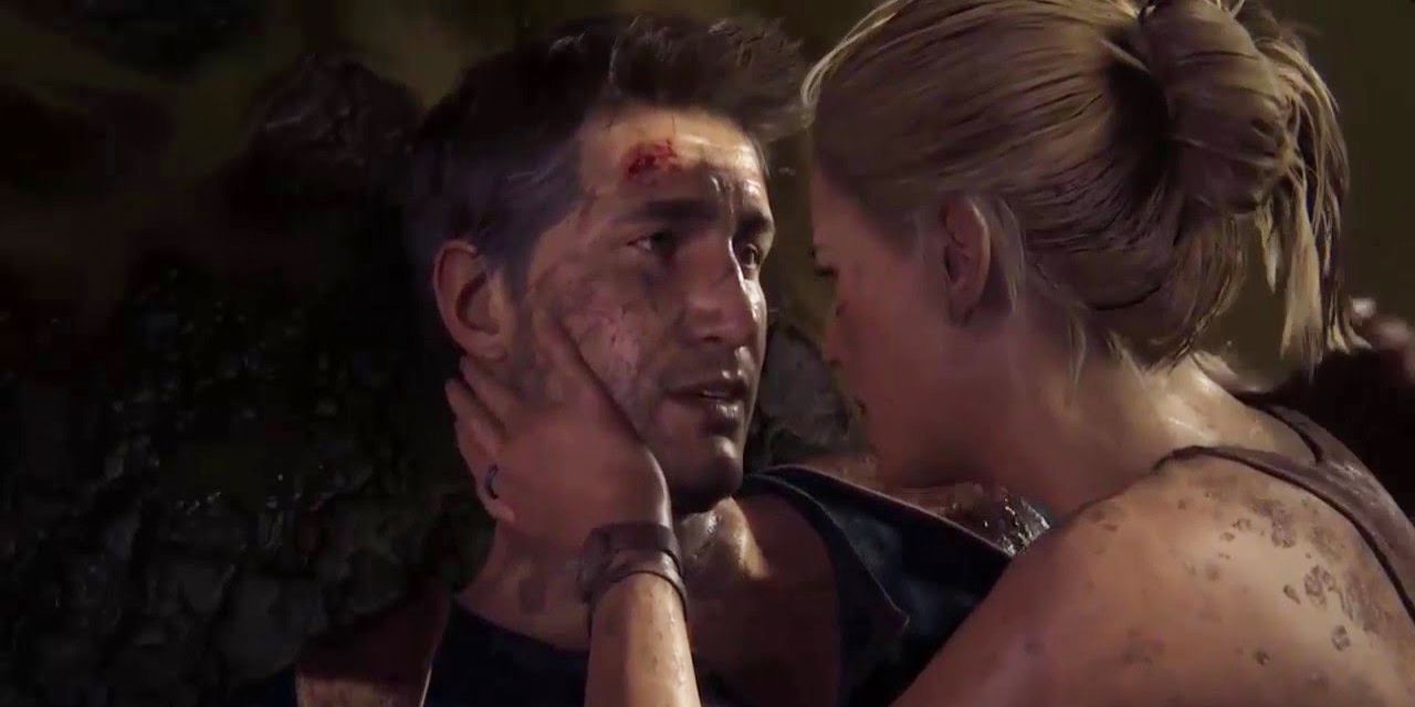 Elena places her hand on a fallen Nate in Uncharted 4.