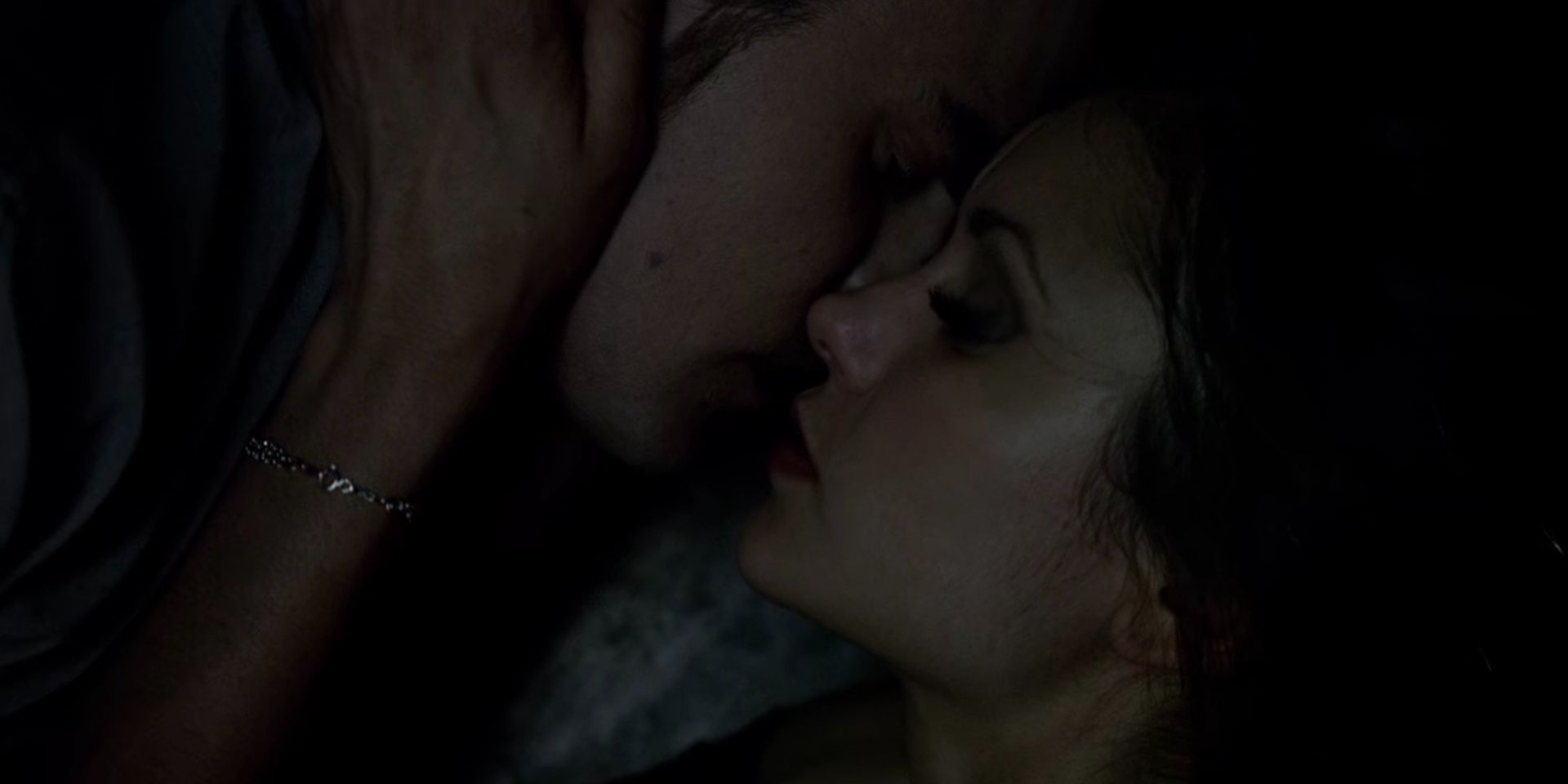 Katherine and Stefan kissing in a coffin in the Vampire Diaries.