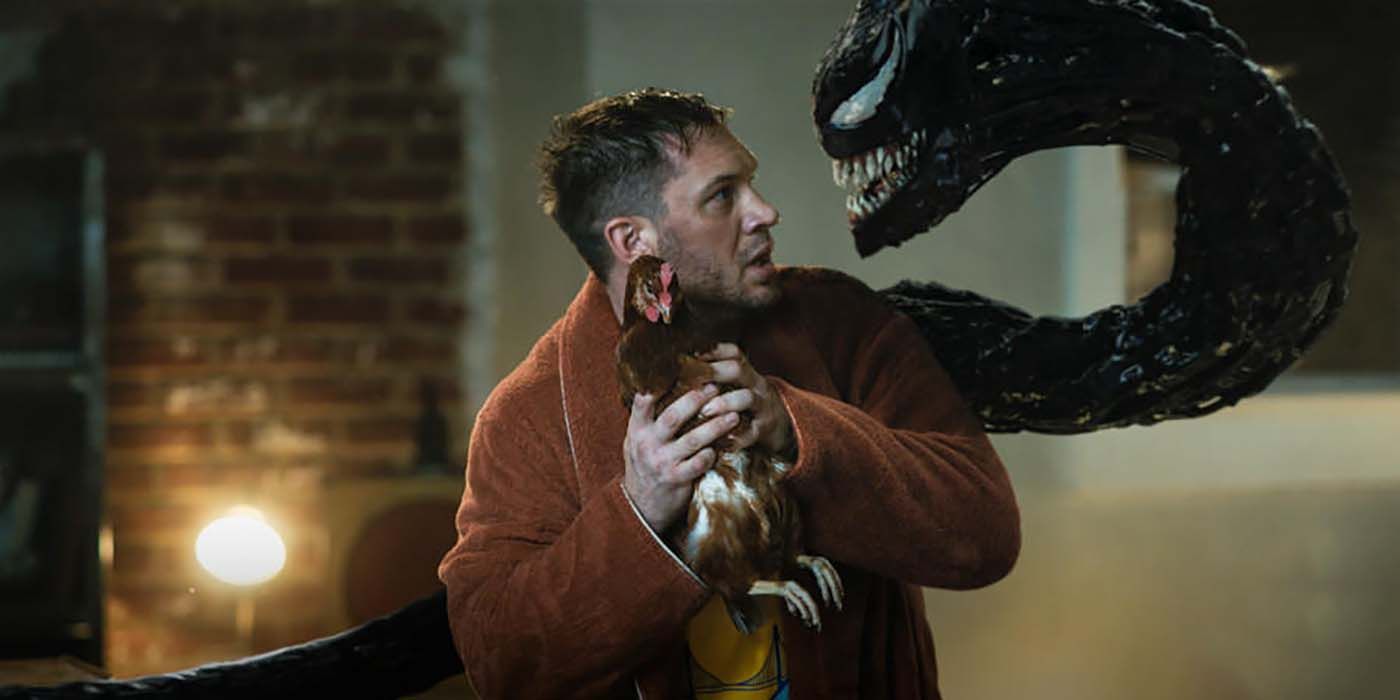 Venom torments Eddie in their apartment in Venom: Let There Be Carnage