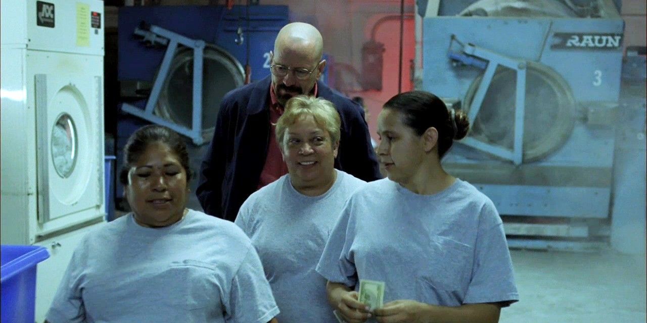 Walt in the laundromat with the cleaning crew in Breaking Bad 