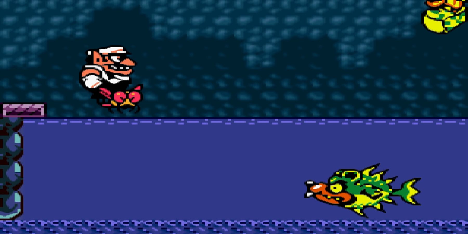Wario fighting an underwater Pesce in Wario Land 3