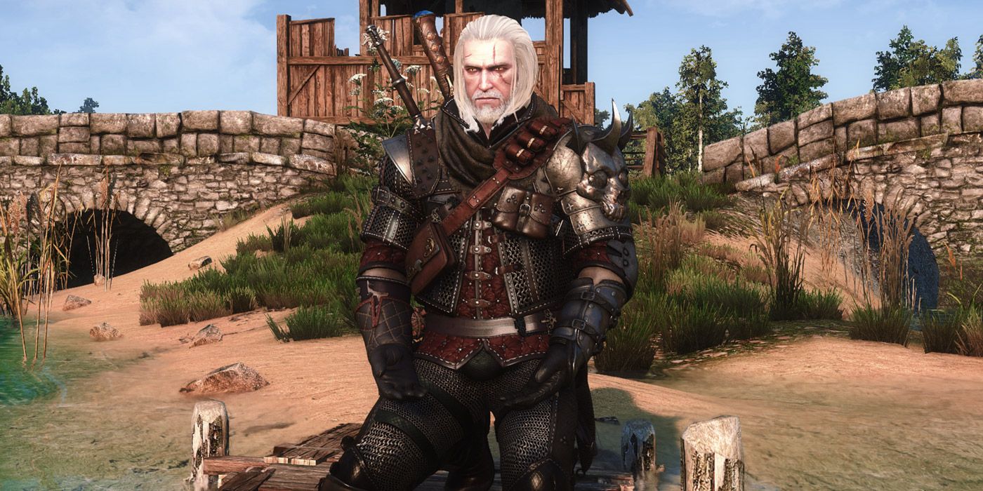 Geralt kneeling down in a set of custom armor in The Witcher III
