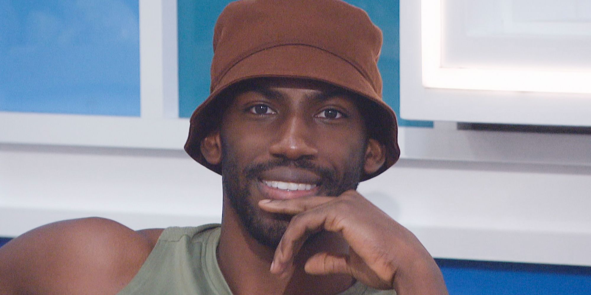 Xavier Prather smiling for the cameras in Big Brother 23 wearing a bucket hat