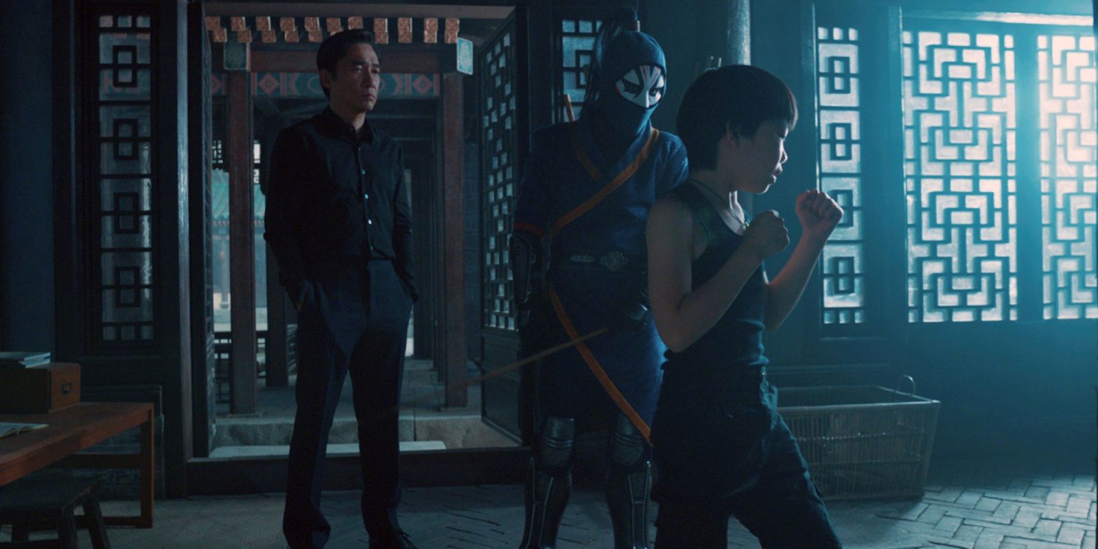 Xu Wenwu observing Shang-Chi's training in Shang-Chi And The Legend Of The Ten Rings