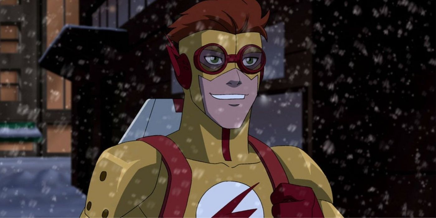 Wally West in his Kid Flash costume standing under the snow and smiling in Young Justice