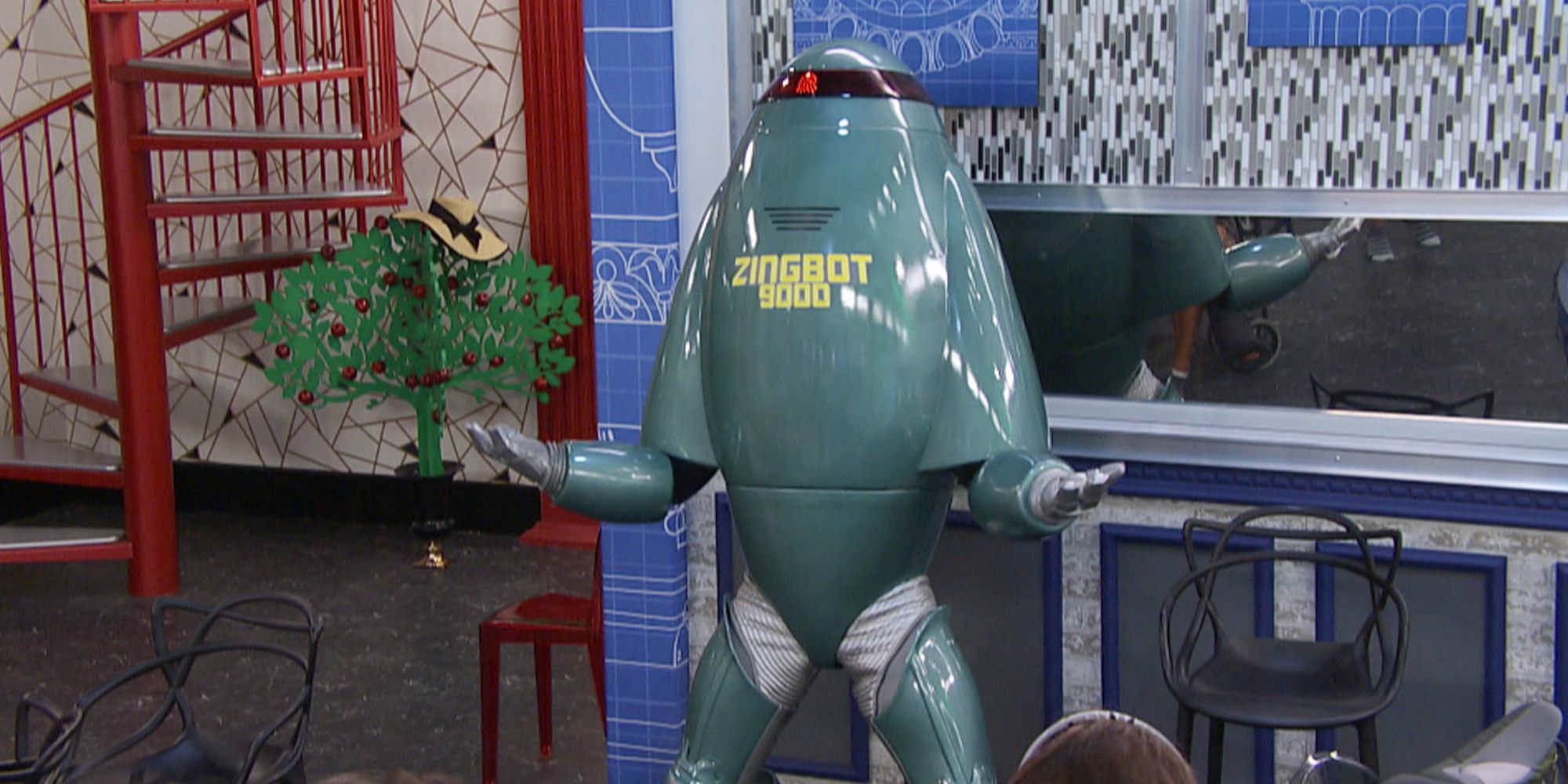 Zingbot from Big Brother standing in the backyard.