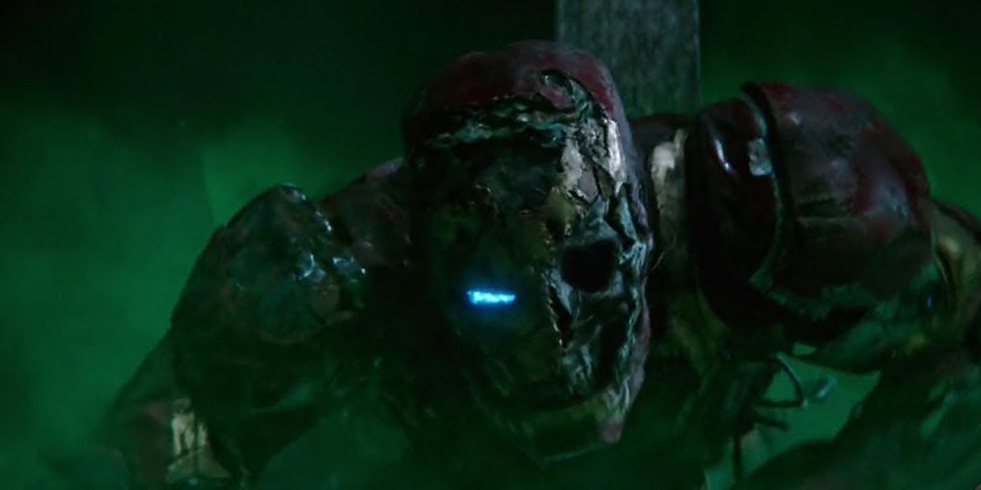 Zombie Iron Man attacks Spider-Man.