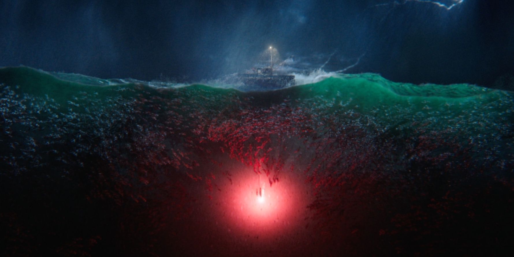 The monsters of the trench surround a boat in Aquaman