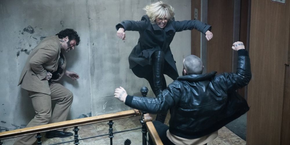 Lorraine thrashes her attackers in the stairwell in Atomic Blonde