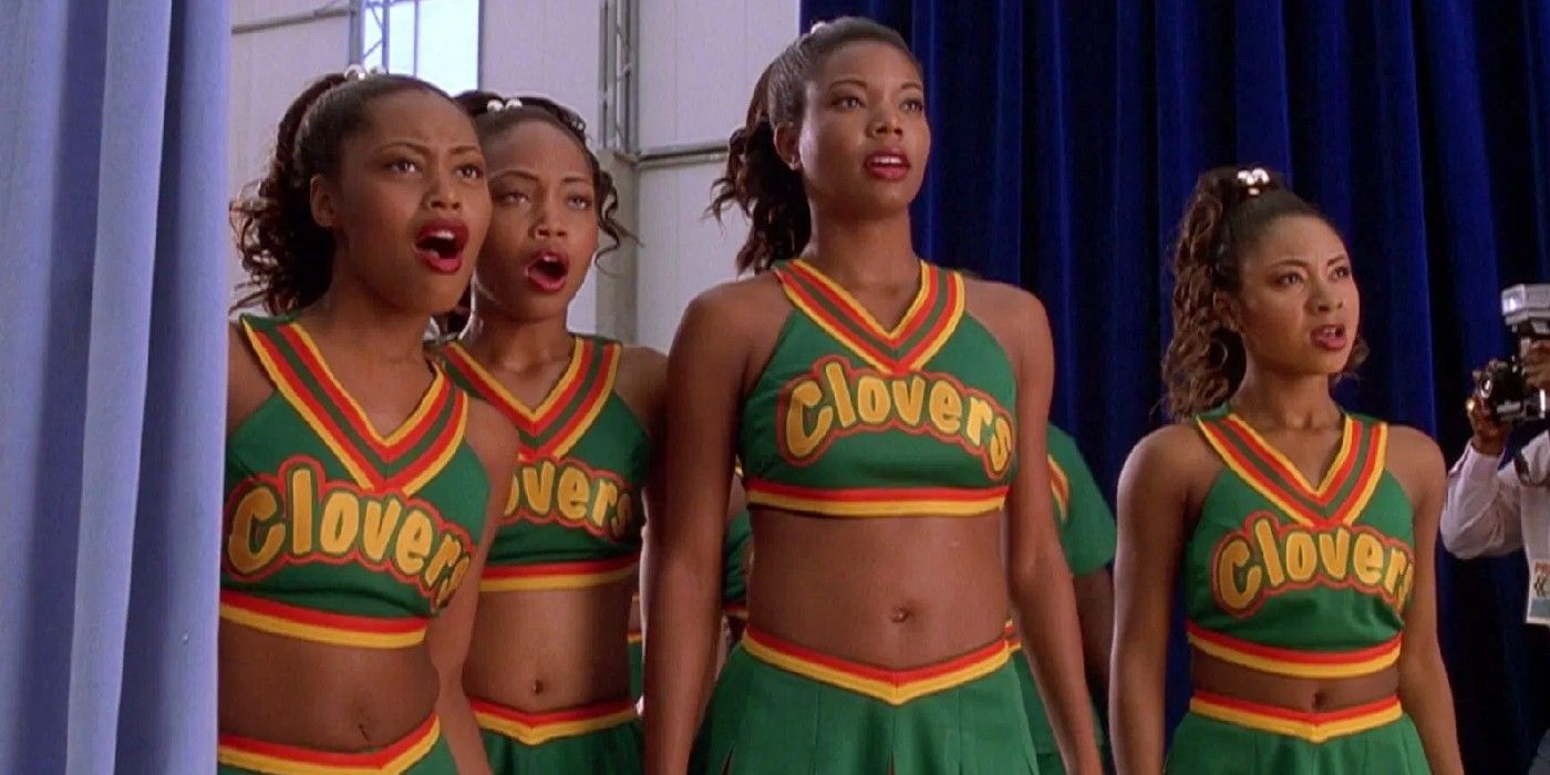 The Clovers standing and watching a routine in Bring It On