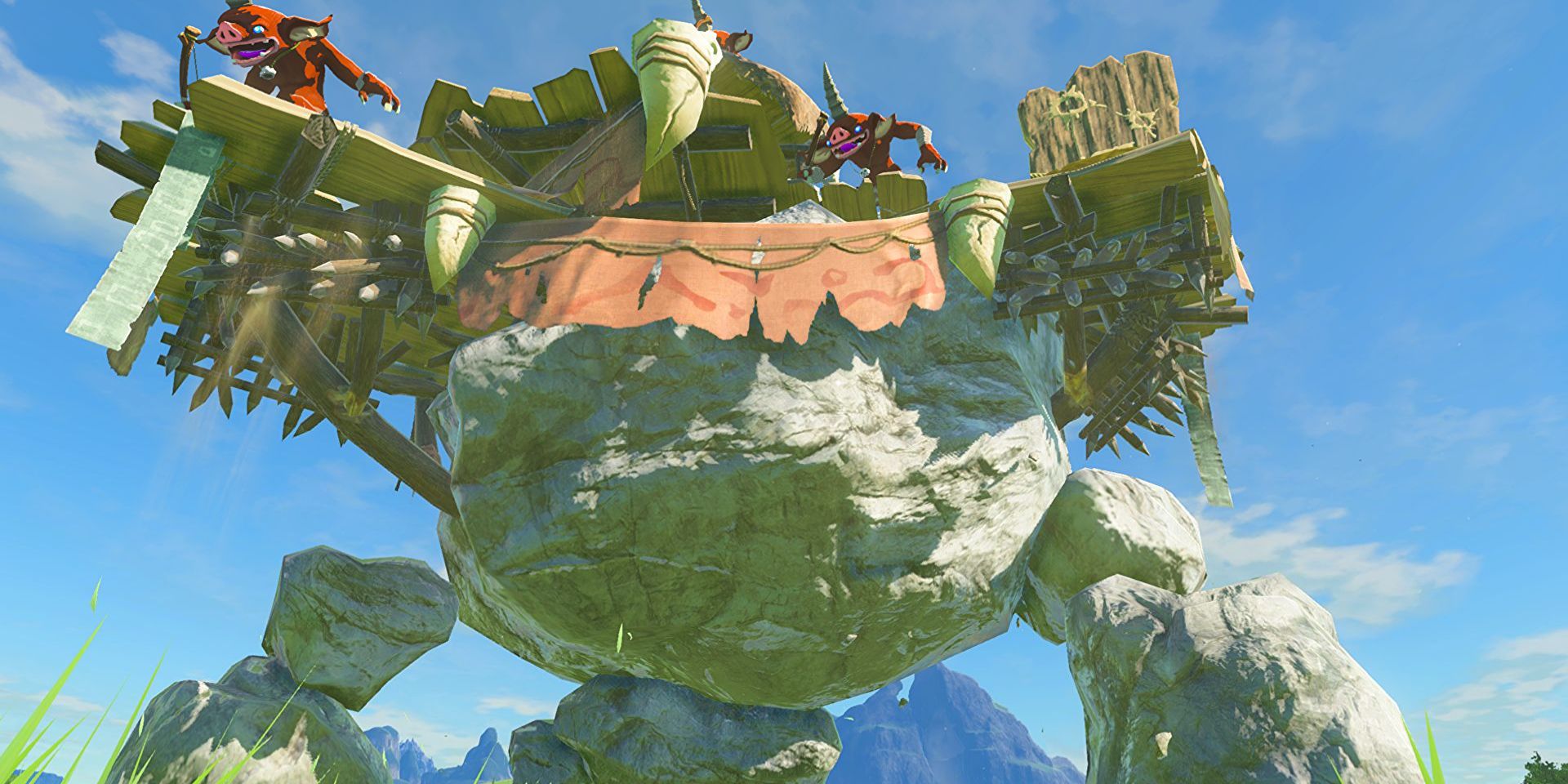 2 demons smile on top of a giant rock fortress in The Legend of Zelda: The Breath of the Wild 2.