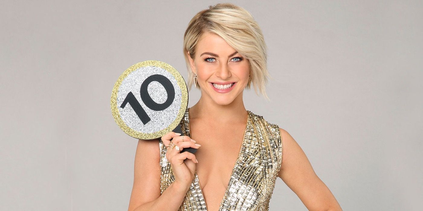 Julianne Hough holding a judges' panel for Dancing With The Stars