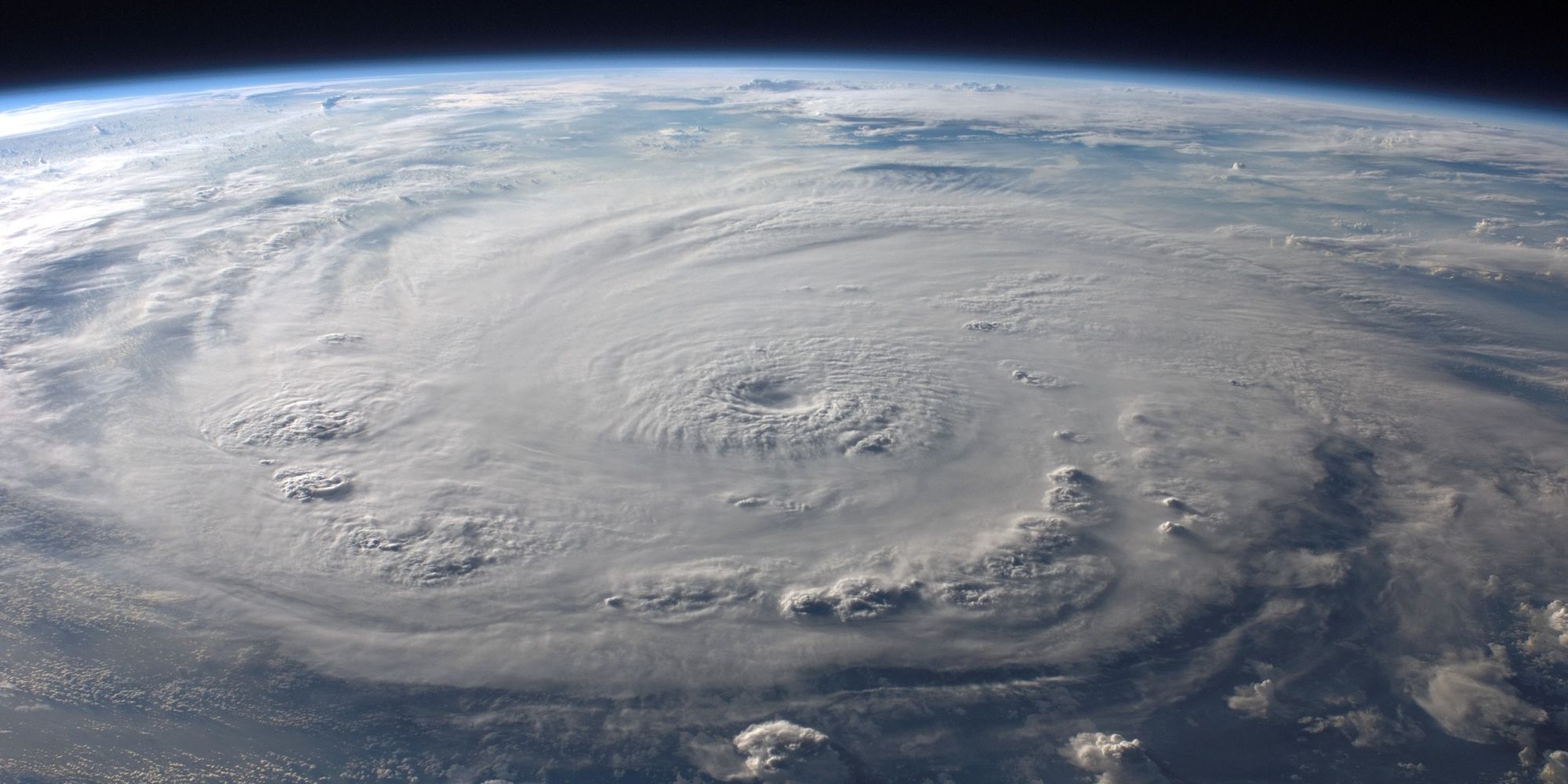 Picture of Earth from space, showing a hurricane