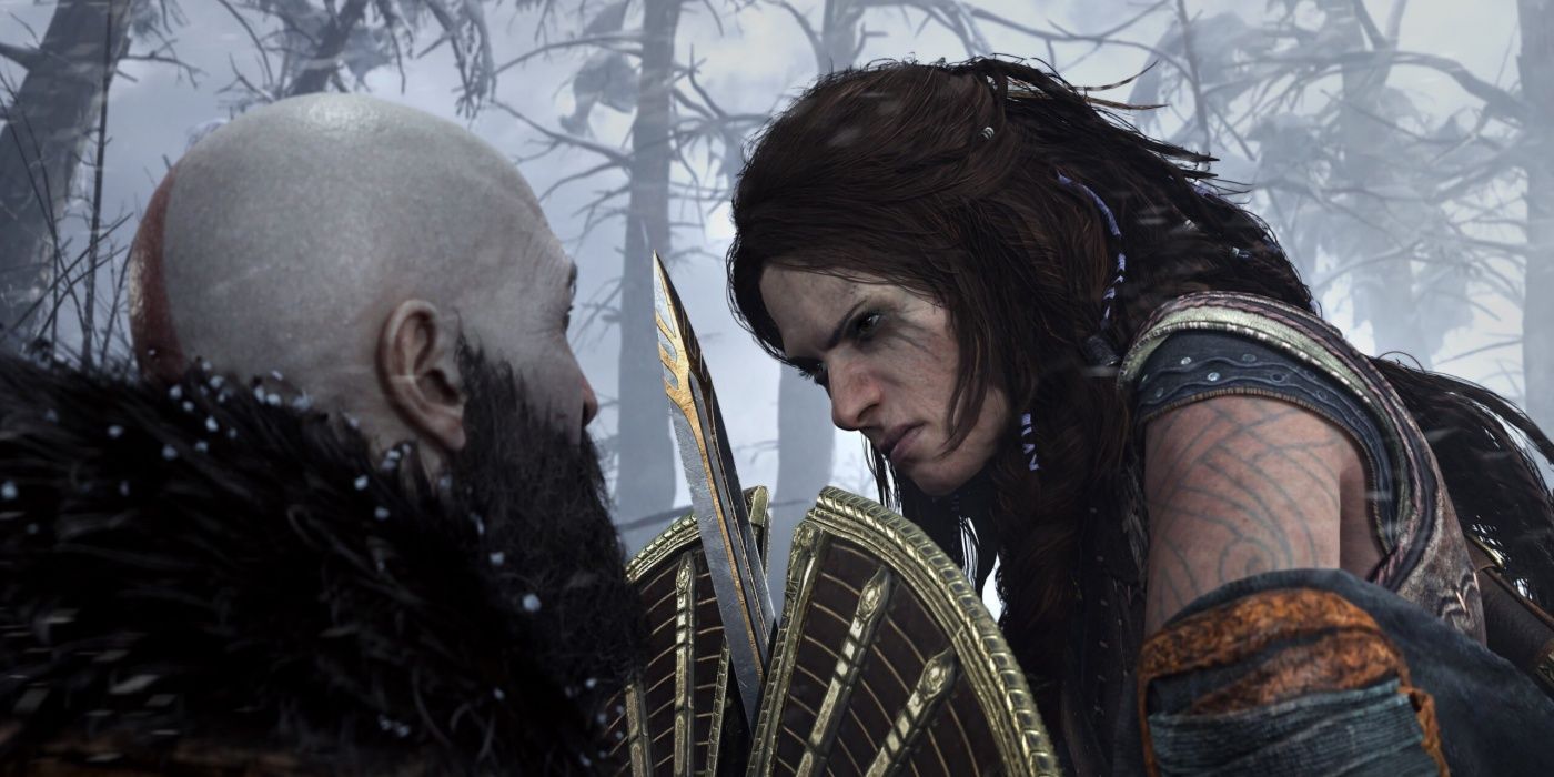 Freya segurando uma espada contra o escudo de Kratos no jogo God of War: Ragnarok.