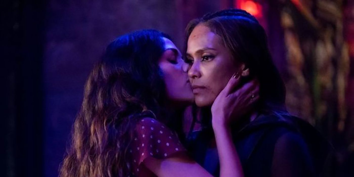 Eve kissing Maze on the cheek, Maze looking sad in a scene from Lucifer.