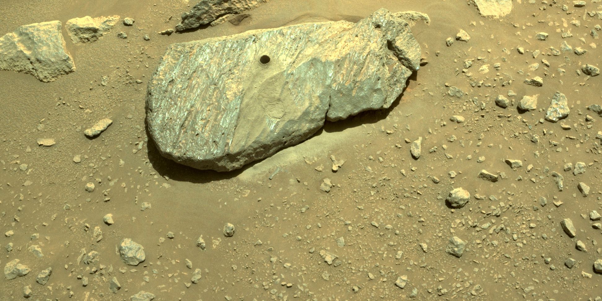 Hole in a Mars rock, made by the Perseverance rover