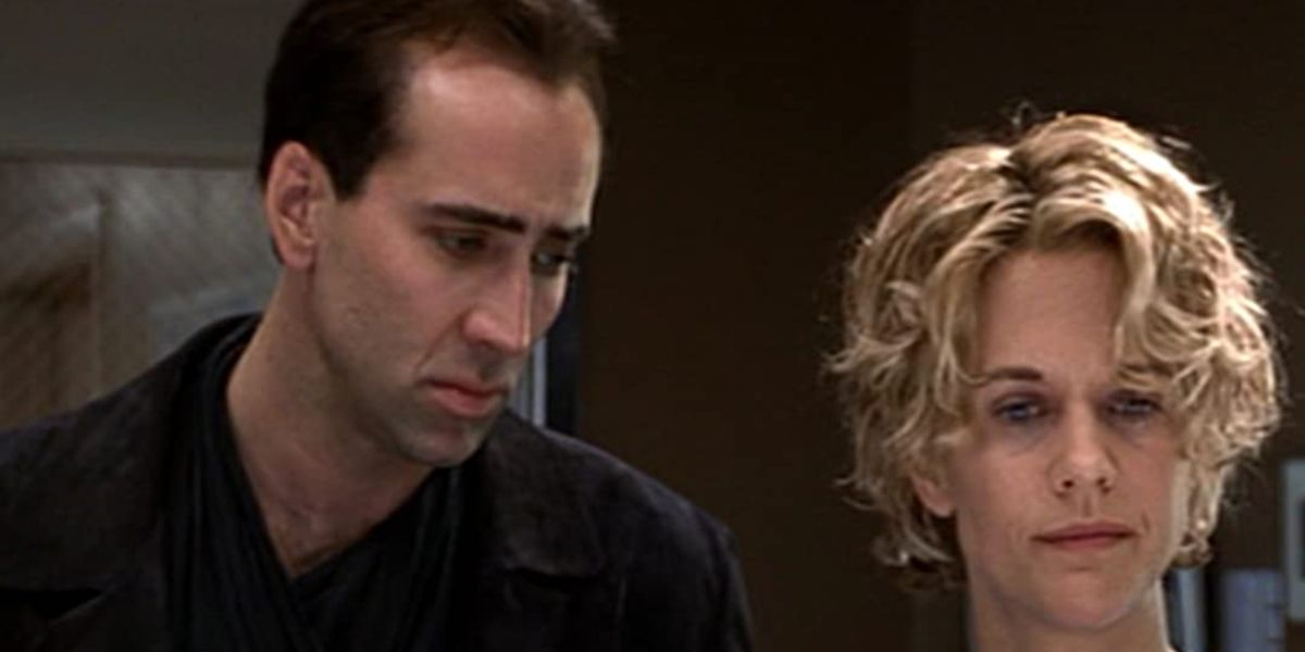 Seth (Nicolas Cage), an angel, gazes at Maggie (Meg Ryan) in City of Angels