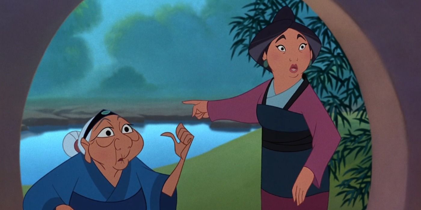 Mulan's mother and grandmother pointing behind them in Mulan