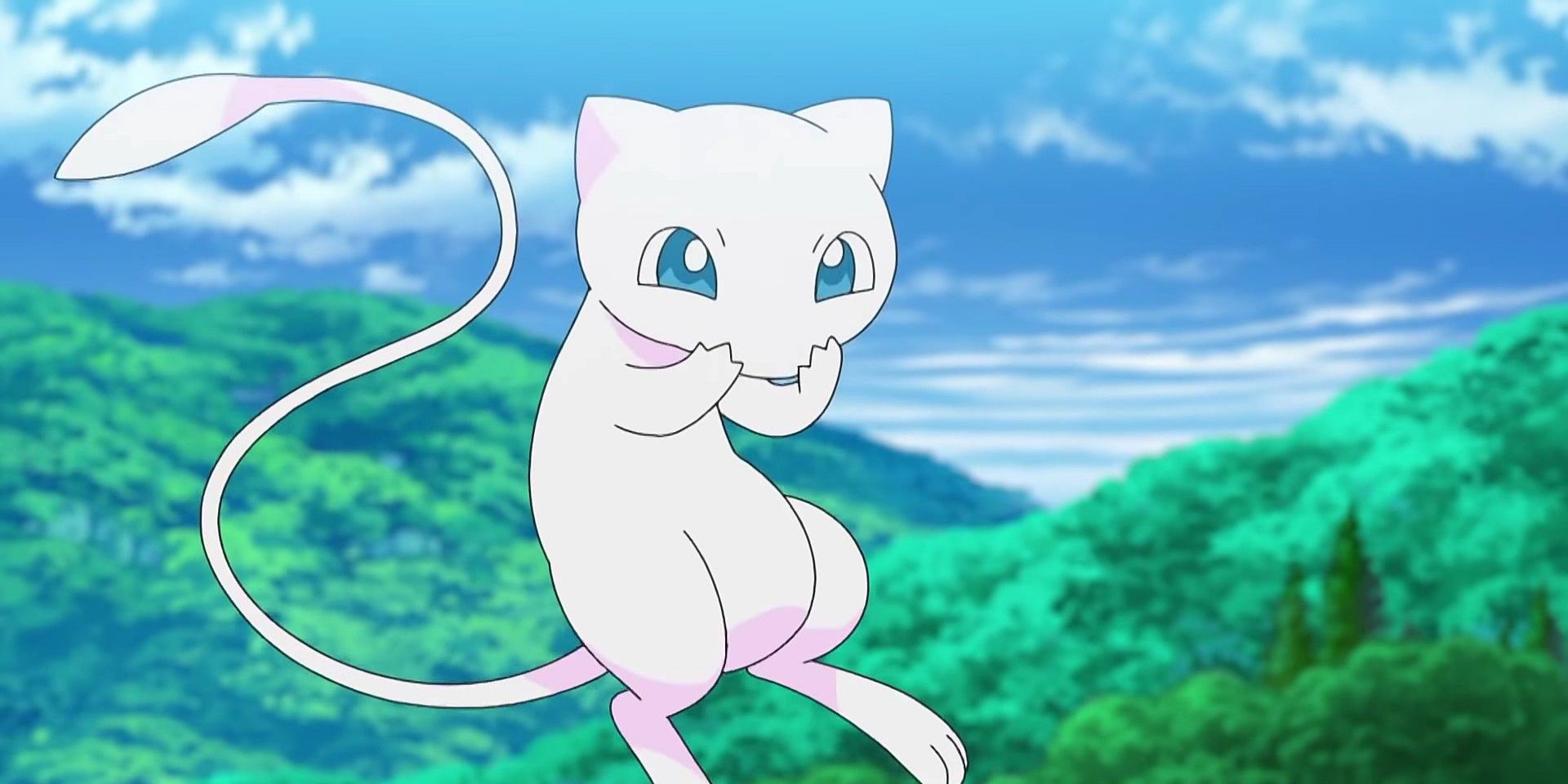 Mew holds its paws to its face in the Pokemon anime