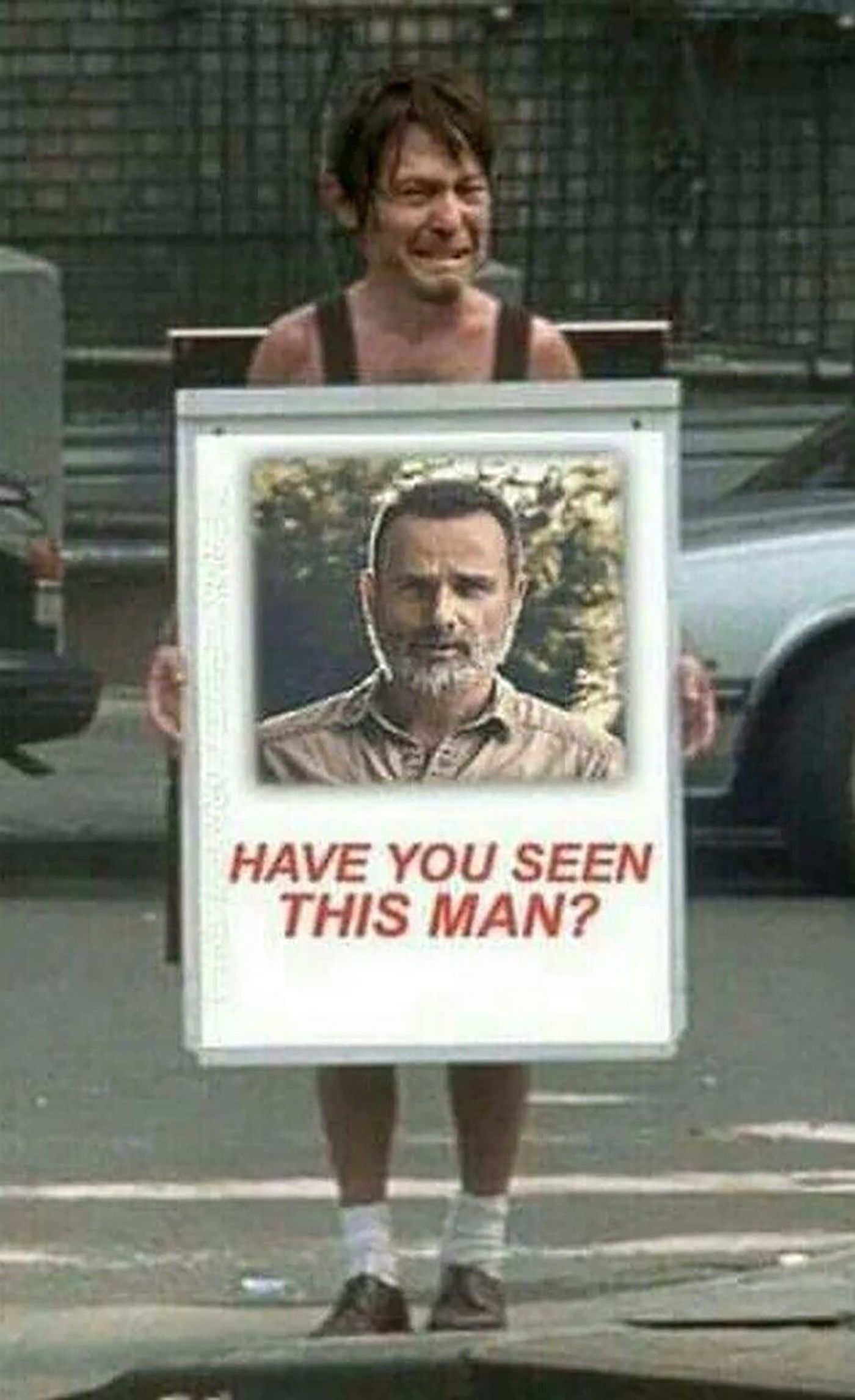 A funny meme showing a body with Daryl's head holding a sign asking where's Rick