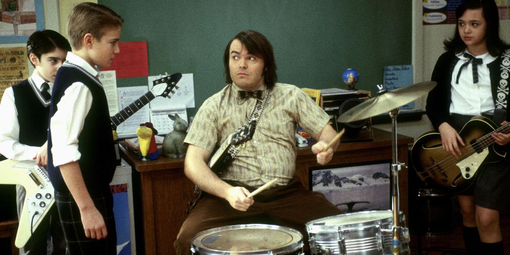Dewey plays drums with the school band in School of Rock