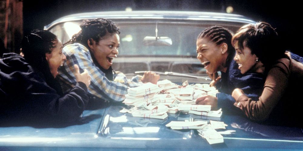 Stoney, Cleo, Frankie and T count cash on the hood of a car in Set it Off