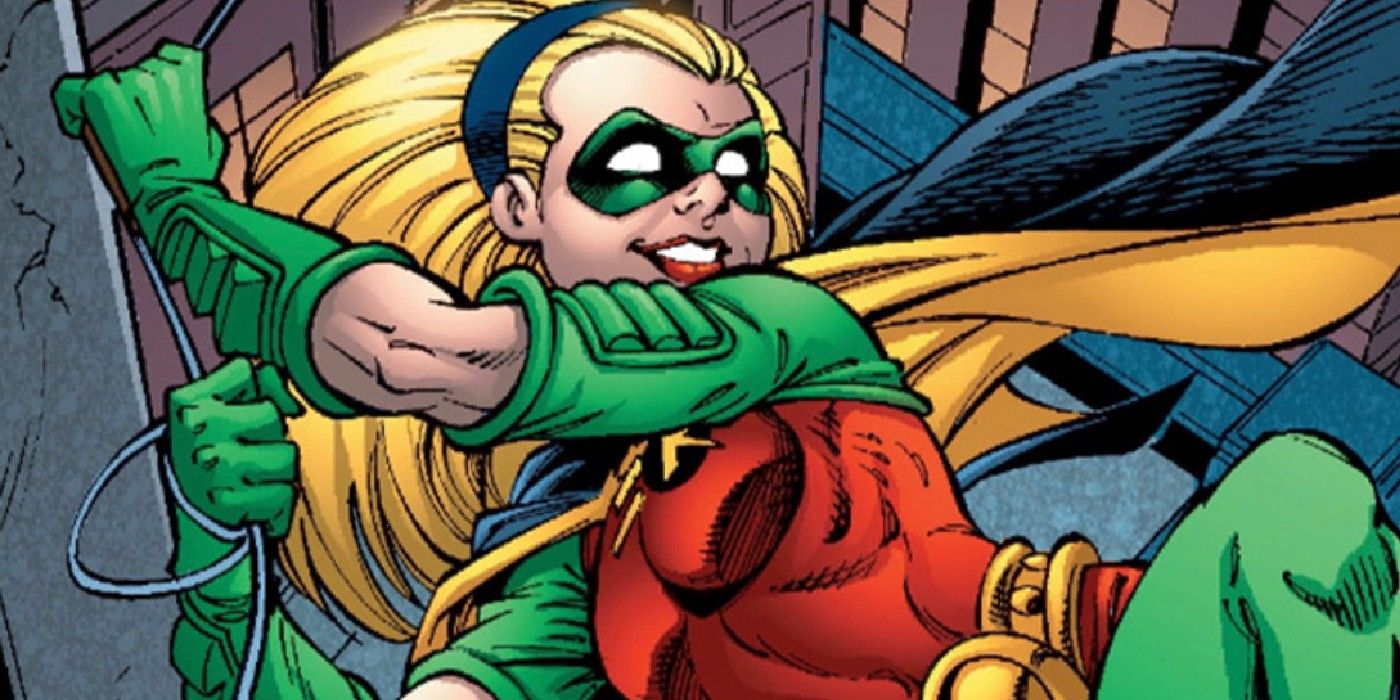 Stephanie Brown in her Robin costume swinging from a rope