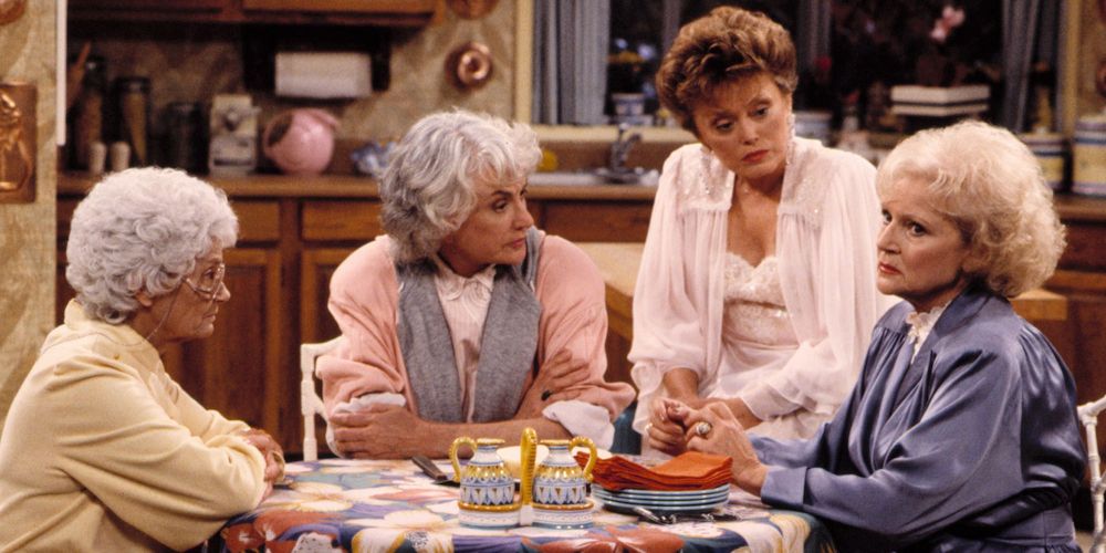 the ladies sit around the dinner table in The Golden Girls