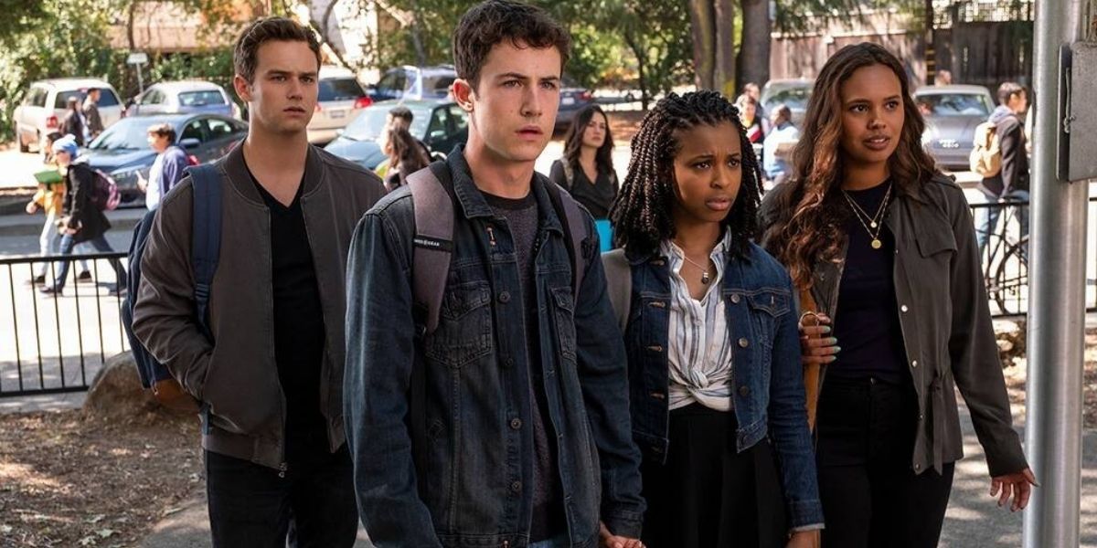 Justin, Clay, Anni, and Jess outside of the school in 13 Reasons Why (2017-2020)