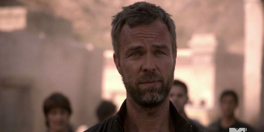 An image of Chris Argent standing in the desert in Teen Wolf