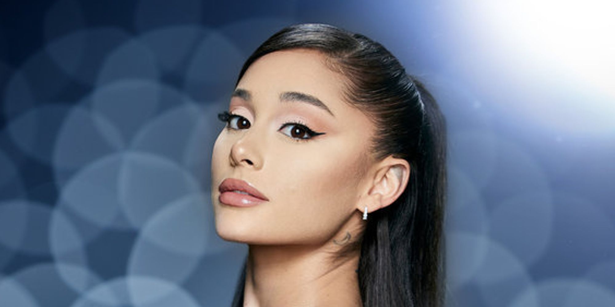 Ariana Grande on The Voice season 21 promo shot blue background