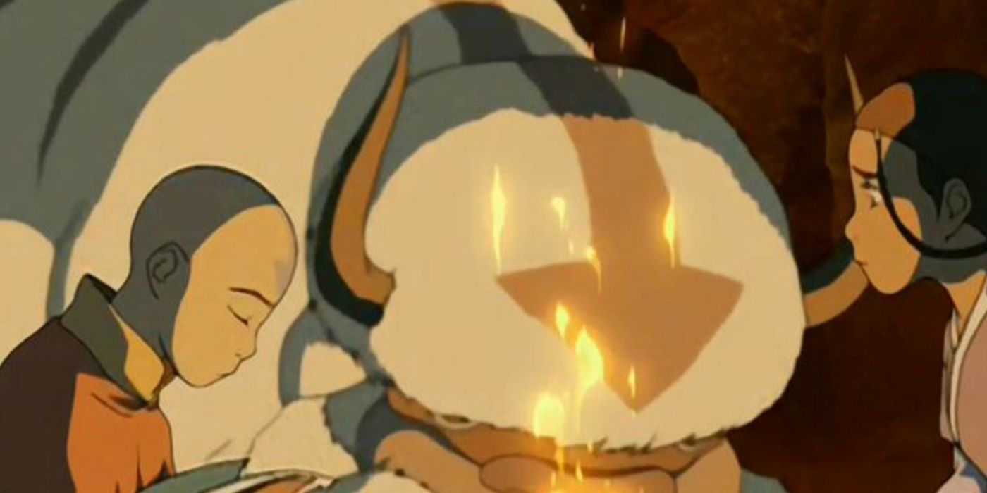 Aang and Katara looking sad by the fire in Avatar: The Last Airbender.