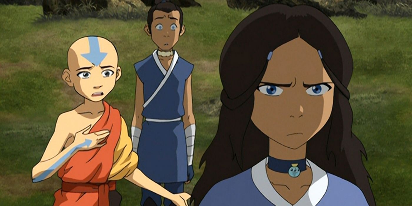 Katara looking annoyed while Aang and Sokka look from behind in Avatar The Last Airbender