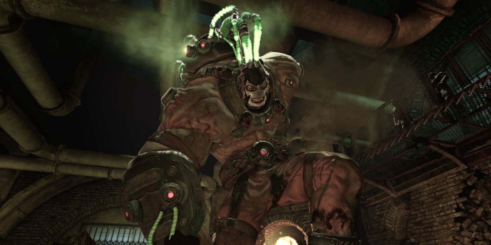 Bane boss fight in Batman: Arkham Asylum underground with pipes running across walls and ceiling