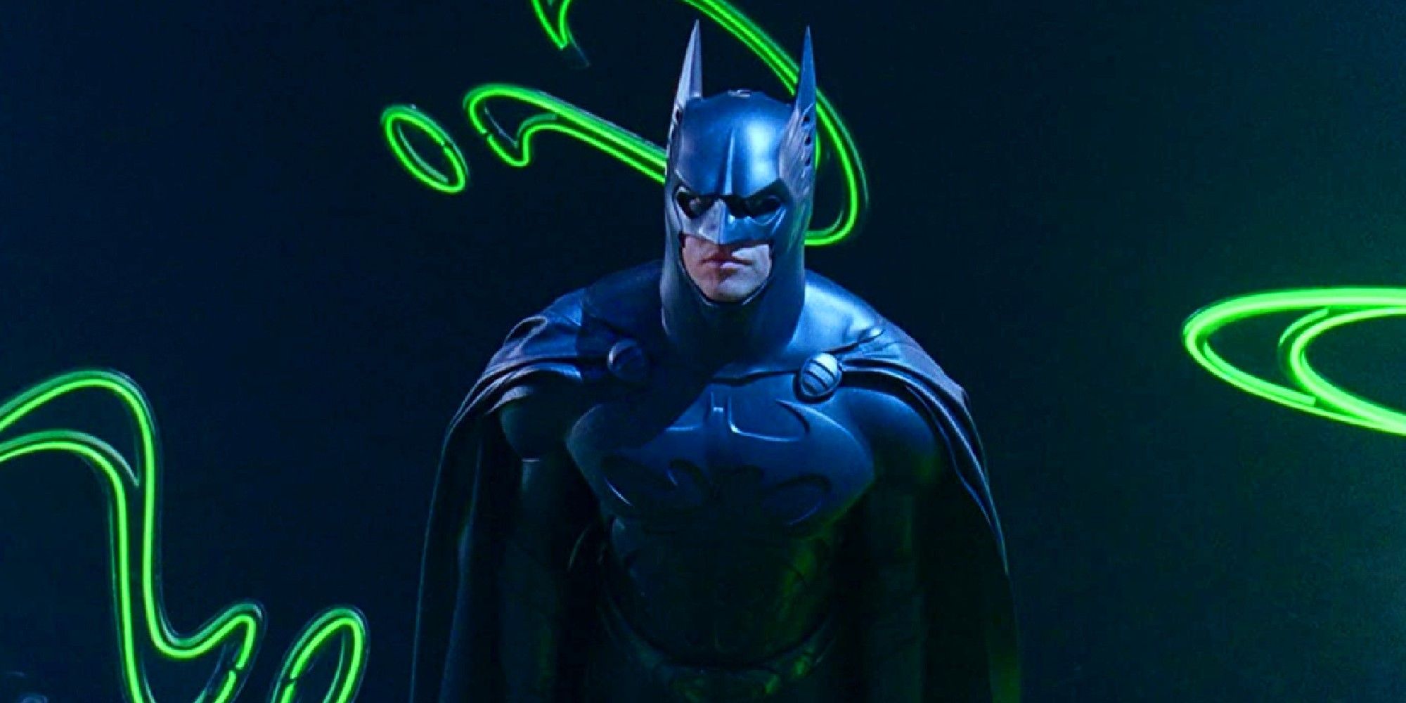 Val Kilmer as Batman surrounded by question marks in Batman Forever
