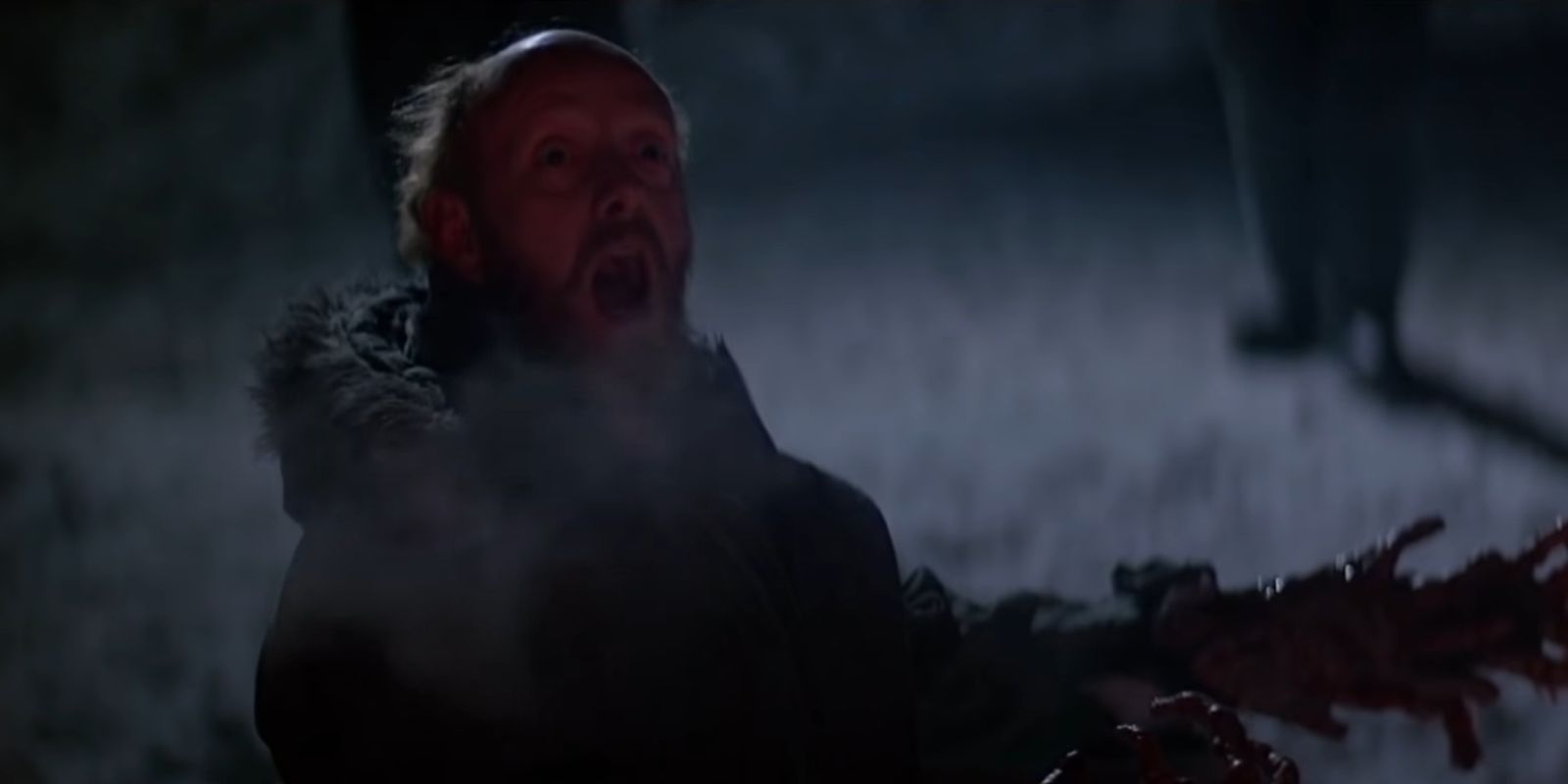 Bennings being assimilated by the Thing in John Carpenter's The Thing