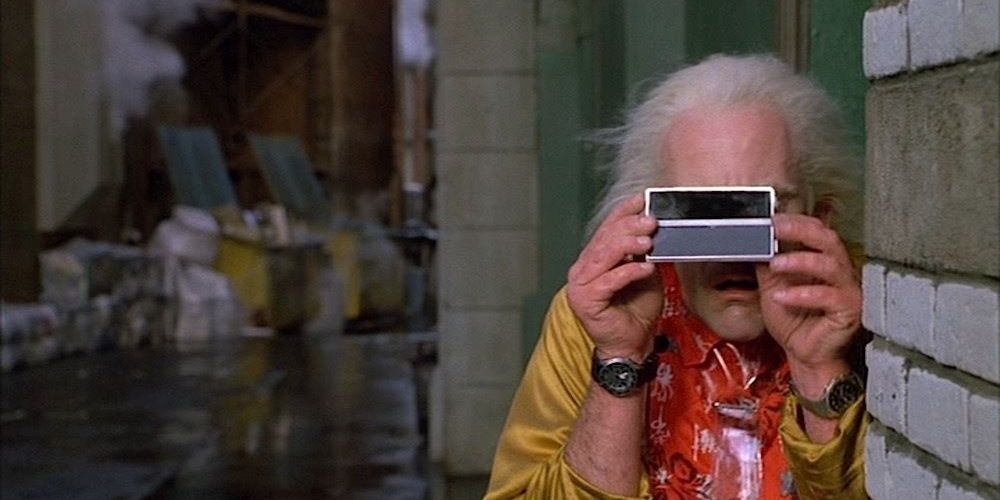 Doc Brown using a binocular card in Back To The Future Part 2